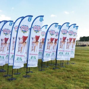 Selection of blade feather flags outside with dogs unite graphic